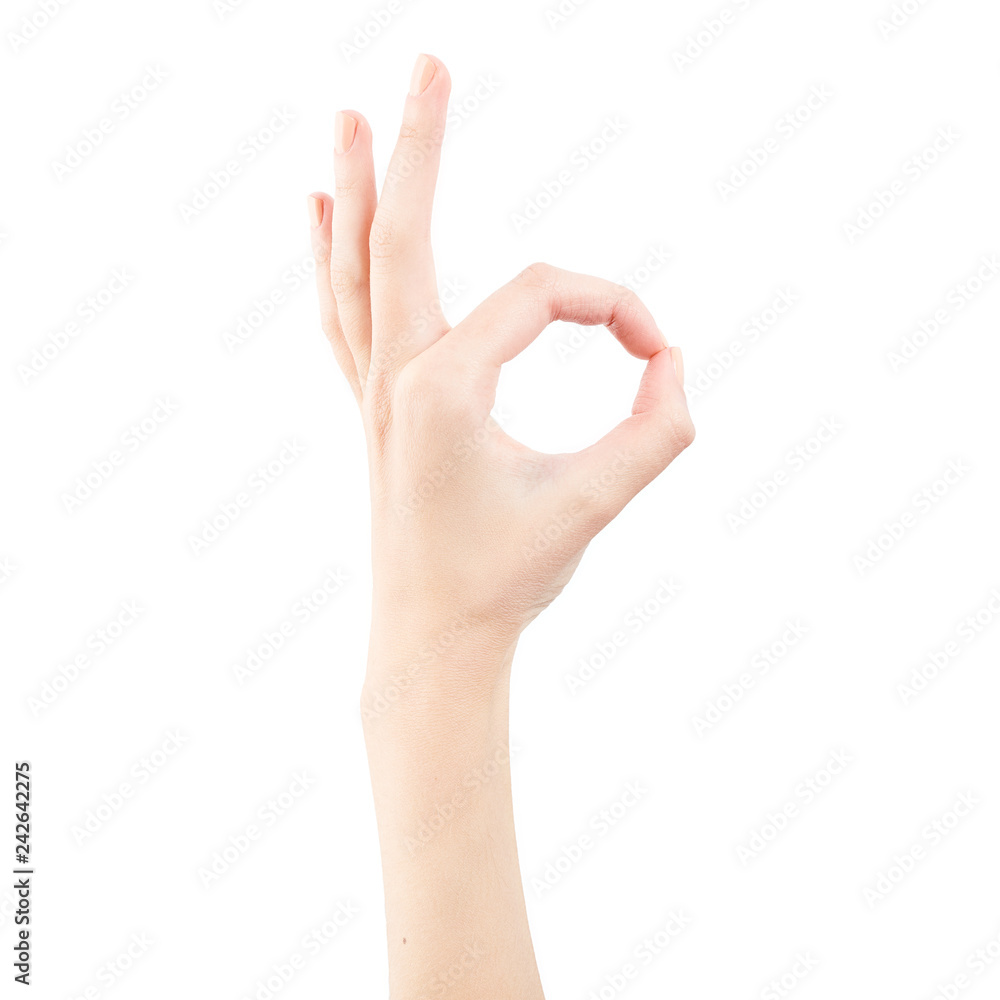 Female hand isolated on white background. White woman's hand showing symbols and gestures. Representative confirmation gesture Female hand isolated on white background. White woman's hand showing symbols and gestures. Representative confirmation gesture