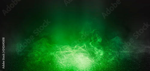Background of empty scene with concrete floor, neon lights and smoke. Background trend color ufo green