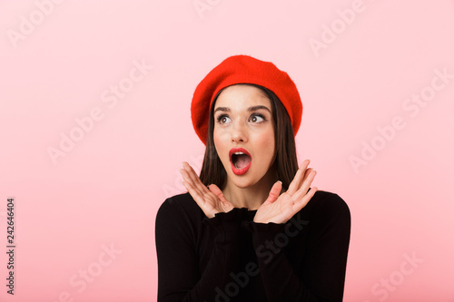 Portrait of a beautiful shocked young woman