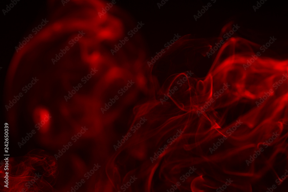 Colorful smoke close-up on a black background Colorful smoke close-up on a black background