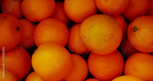  Close-up of orange fruits in basket at supermarket 4k photo