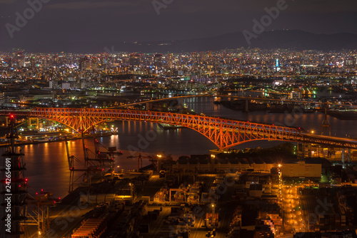 Minato Bridge  red bridged  view on Cosmo tower Osaka Japan