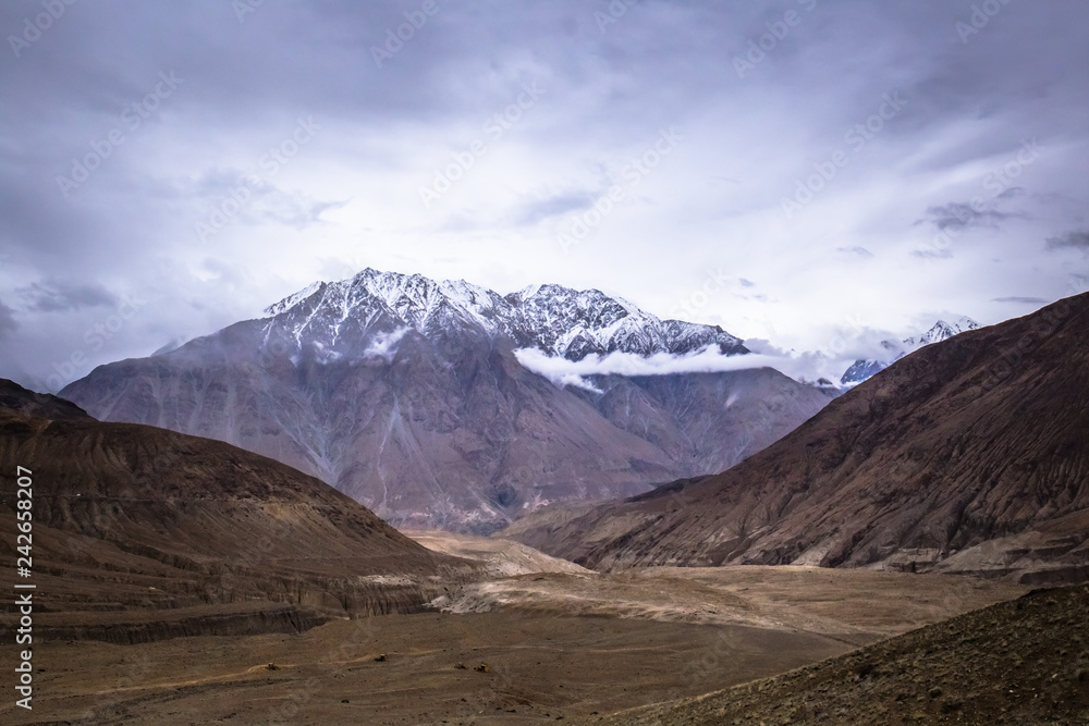 Scenic view between path on Khardung La, mountain pass in the Ladakh region of Jammu and Kashmir.