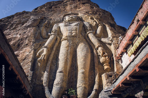 A statue of Maitreya Buddha carved into the rock at Mulbekh Monastery