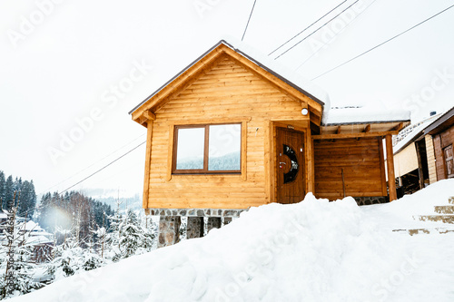 Wallpaper Mural small wooden house in snow Torontodigital.ca