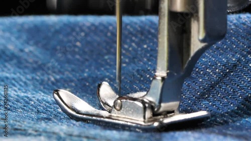 Sewing Denim Jeans with sewing machine.