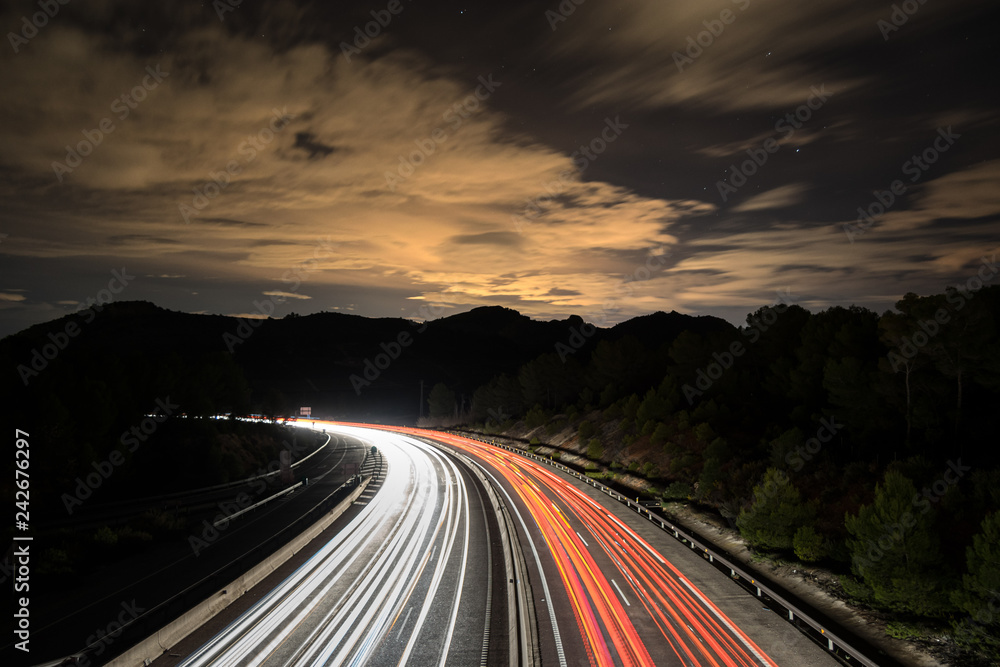 Traffic at night in the mountain. Beautiful nightscape. Long exposure shot