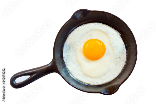 Slika na platnu Cast iron pan with one fried egg