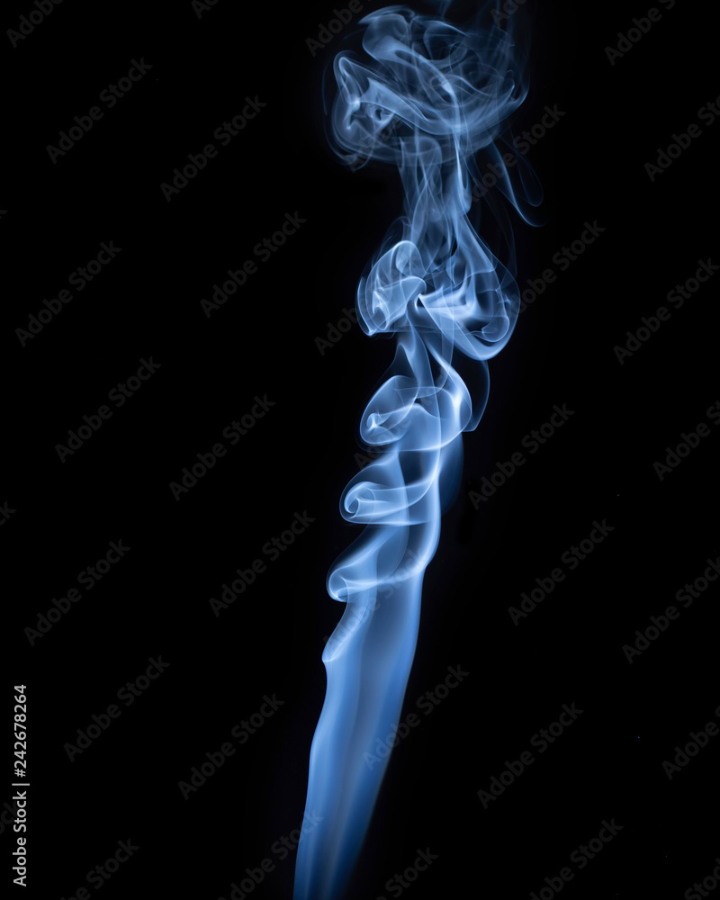 abstract blue smoke on black background. vertical view. abstract blue smoke on black background. vertical view.