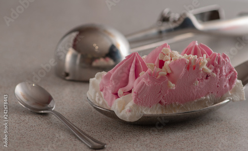Ice Cream Pink with Strawberries. is filed in a silver plate