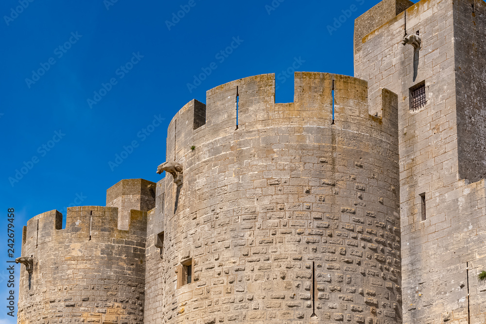 Aigues-Mortes in the south of France, the walls of the city with the gargoyles 