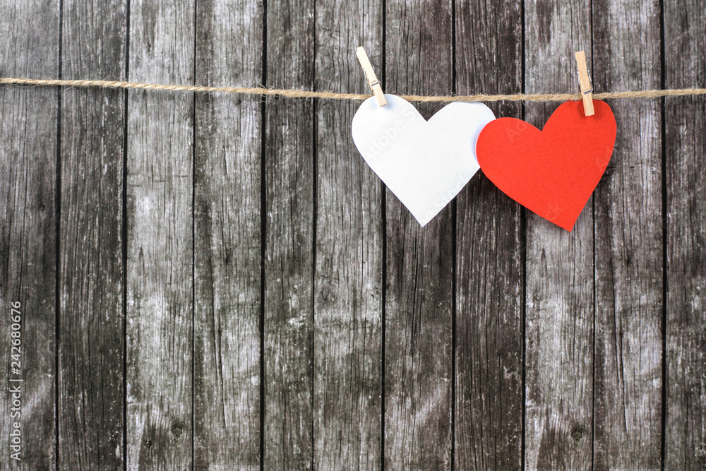 Valentine's hearts on a dark wooden background. Valentine's hearts on a dark wooden background.
