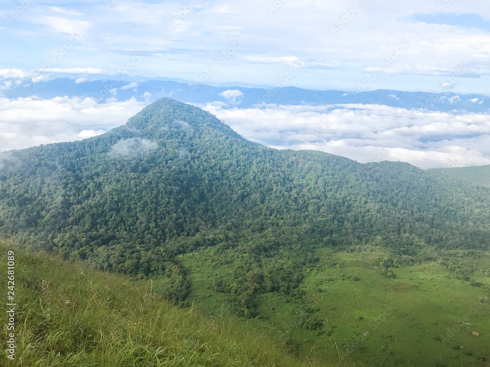 Fototapeta premium Green landscape with mountain and beautiful clouds at Chaing mai, Thailand