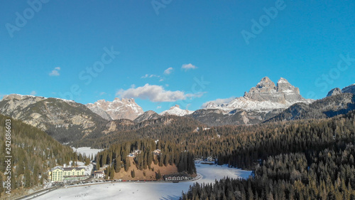 Mountains and iced lake of Misurina, aerial view of italian alps © jovannig