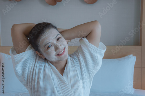 girl's happy time of Face Mask pad , beauty skill massage spa of yourself. photo