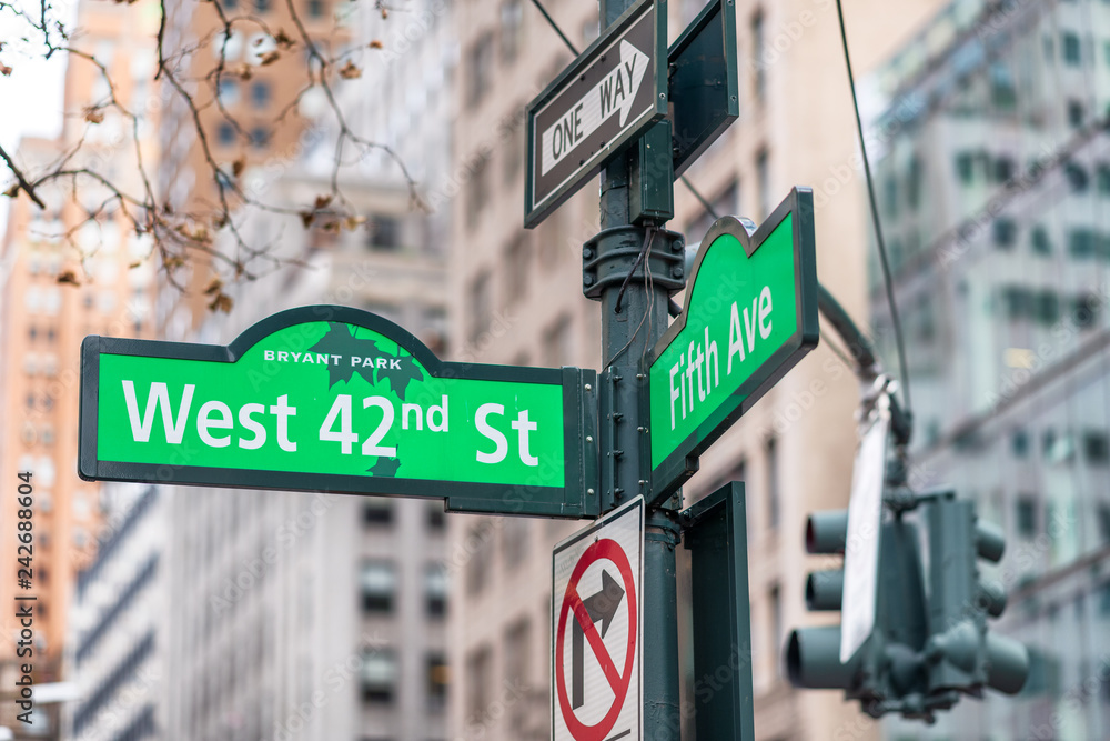 42nd street and 5th avenue street signs