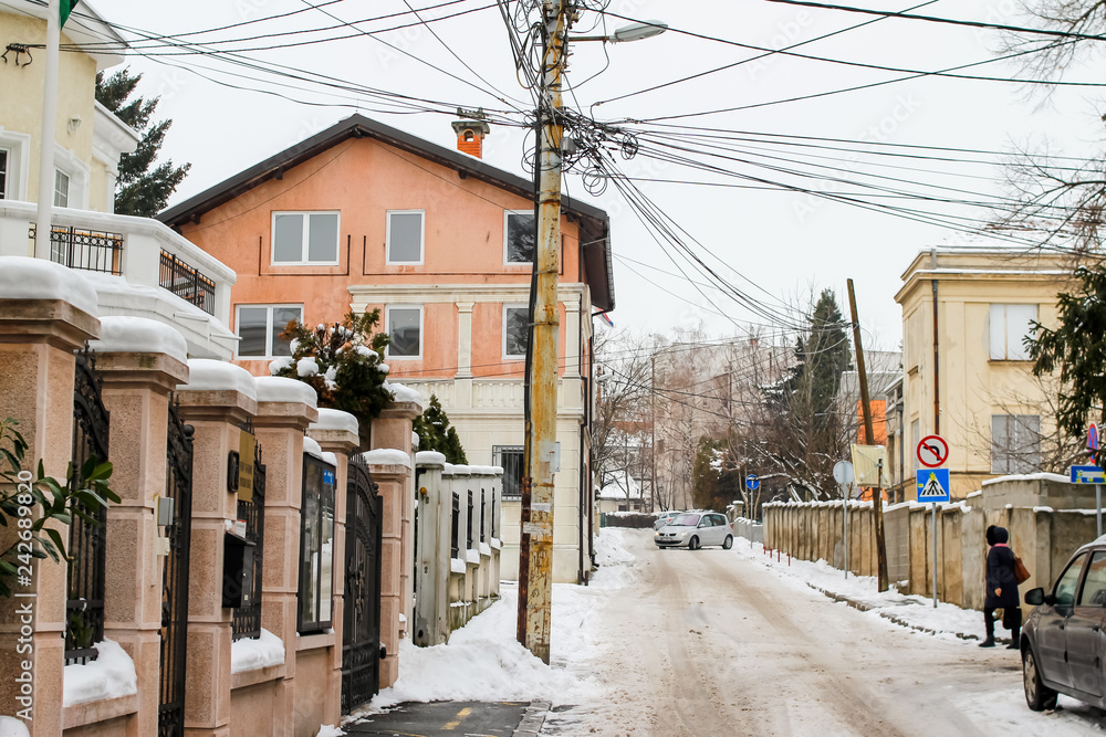 Street of town covered with snow. Belgrade is a largest town and capital of Serbia. Dedinje is a rich part of town. Street of town covered with snow. Belgrade is a largest town and capital of Serbia. Dedinje is a rich part of town.