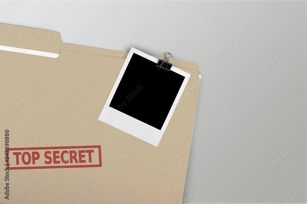 Folder with the words Top Secret stamped on it, Isolated on a Folder with the words Top Secret stamped on it, Isolated on a