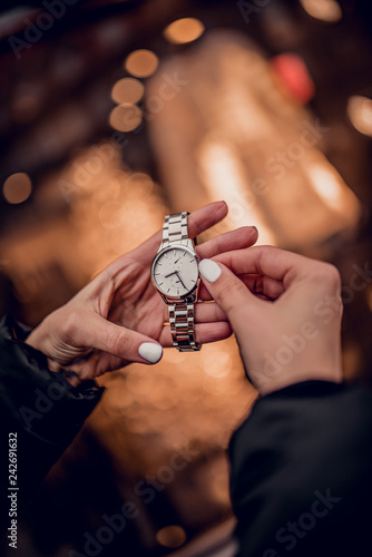 Amazing silver watch on woman hand