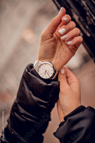 Very stylish silver watch on woman hand
