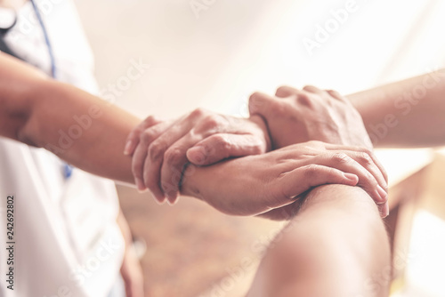 People hand assemble as a connection meeting teamwork concept. Group of people assembly hands as business or work achievement. Man and women touch each other hands after meeting. Teamwork conceptual.