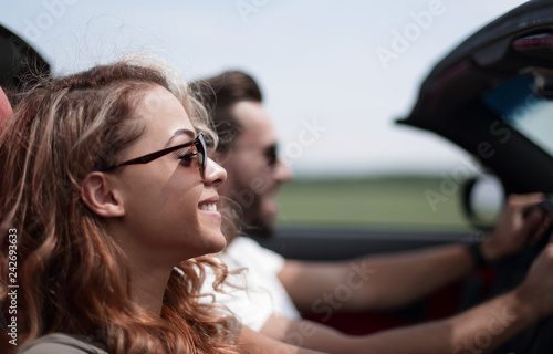 close up.couple traveling in their convertible car © ASDF