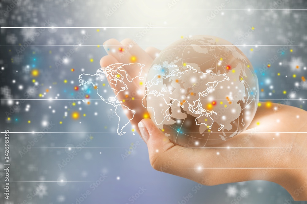 Female hands holding glass Globe on background Female hands holding glass Globe on background