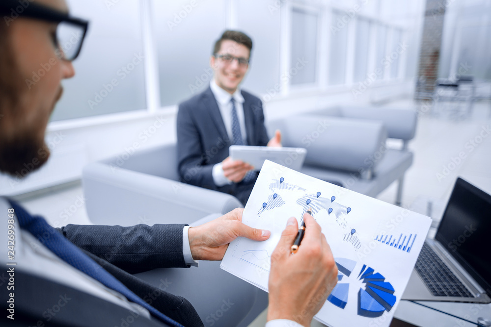 close up.employees analyze statistical data close up.employees analyze statistical data