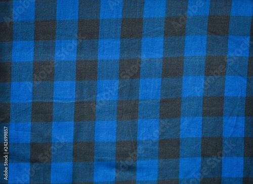 Hipster checkered black and blue cotton fabric texture
