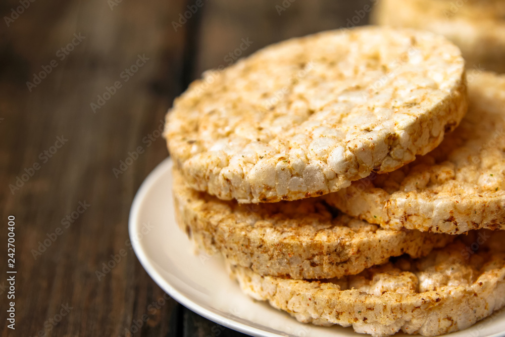 Salty rice crackers galettes with spices. Tasty salty healthy biscuits.