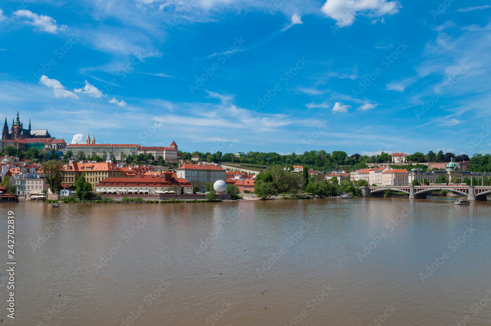 View of  old town and Prague castle. River Vltava, Czech Republic .
