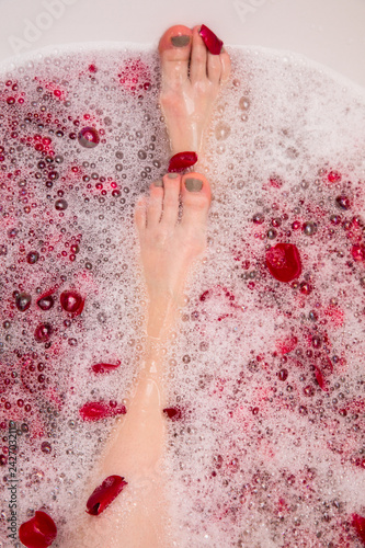 Romantic Valentines day bath with rose petails, woman in home spa, luxury self care