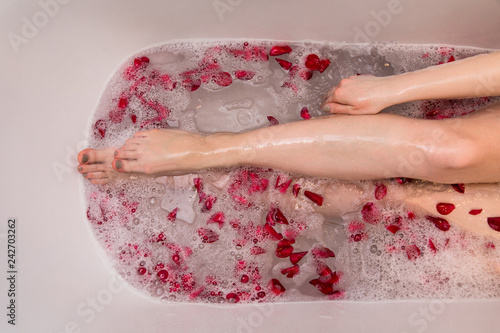 Romantic Valentines day bath with rose petails, woman in home spa, luxury self care