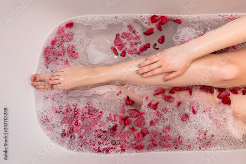 Romantic Valentines day bath with rose petails, woman in home spa, luxury self care