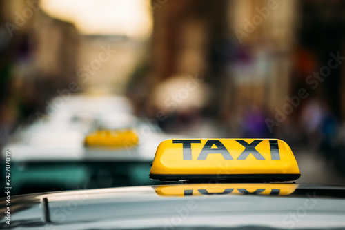 Taxi Sign On Roof Of Car