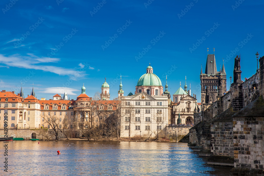 The beautiful old town of Prague city, the Vltava river and the iconic Charles bridge