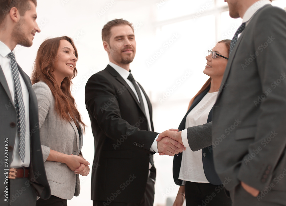 handshake to make a deal with your partner