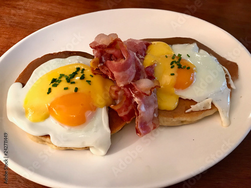 Salted Pancakes with Eggs and Crispy Bacon for Breakfast. Salty Fast Food.