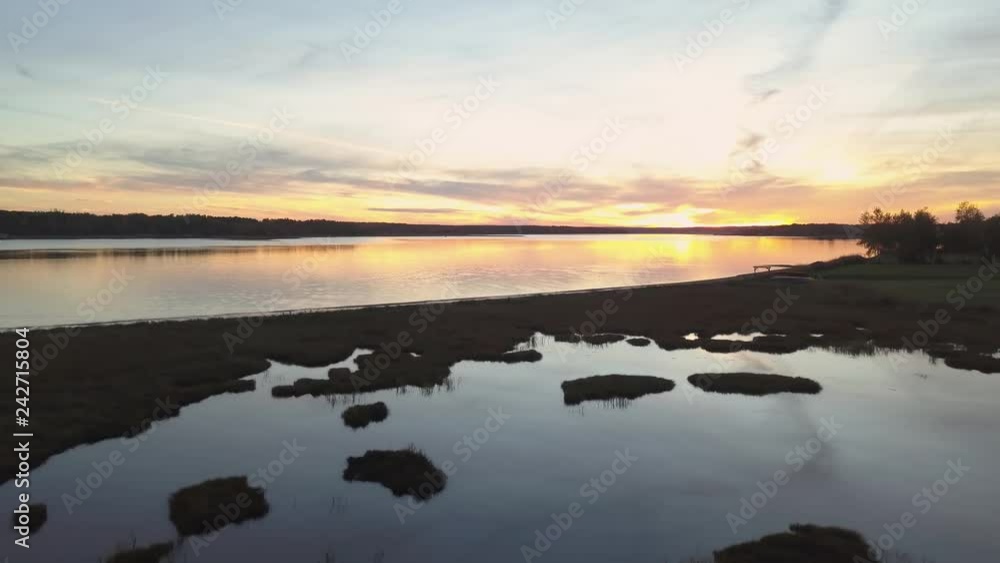 Aerial view of a beautiful sunset by the Cocagne River. Taken in New Brunswick, Canada. Aerial view of a beautiful sunset by the Cocagne River. Taken in New Brunswick, Canada.
