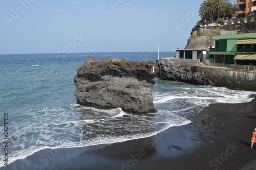 Black Sand Beach With A Large Stone In Its Interior In Puerto Naos In The City Of Los Llanos. Travel, Nature, Landscapes.11 July 2015. Los LLanos Isla De La Palma Canary Islands Spain. photo