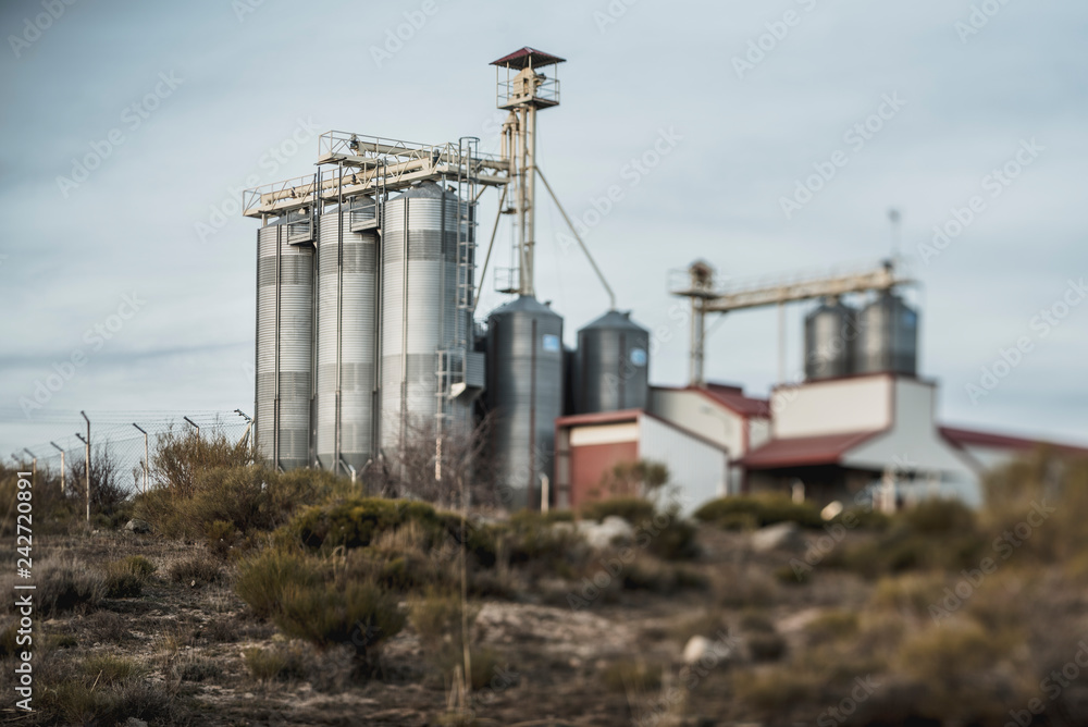 Remote landscape with silo on hillside Remote landscape with silo on hillside
