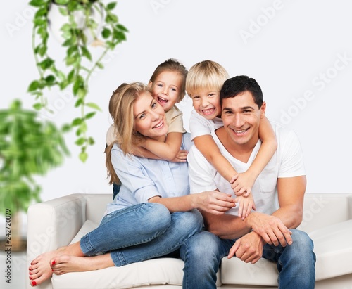 Beautiful smiling family on background