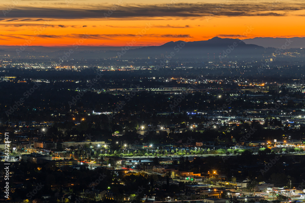 Dramatic dawn view of the San Fernando Valley neighborhoods in the city of Los Angeles, California.