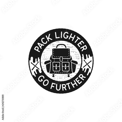 Travel vintage logo - Pack lighter go further quote. Vitnage hand drawn camping emblem with backpack icon. Silhouette black style. Stock vector patch isolated