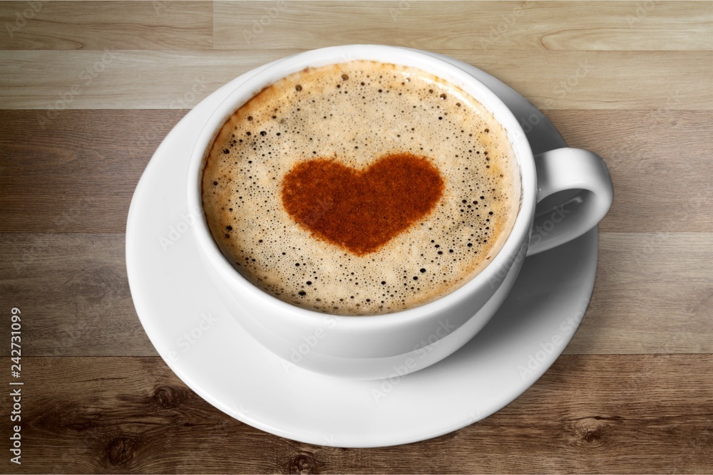 Latte coffee with heart symbol isolated on white background Latte coffee with heart symbol isolated on white background