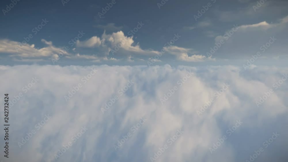 Flight above clouds against beautiful blue sky, 4K Flight above clouds against beautiful blue sky, 4K