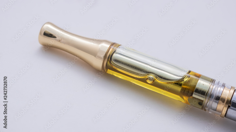 Naklejka premium THC/CBD Cannabis Oil & Terpenes Filled Cartridges Up Close White Background