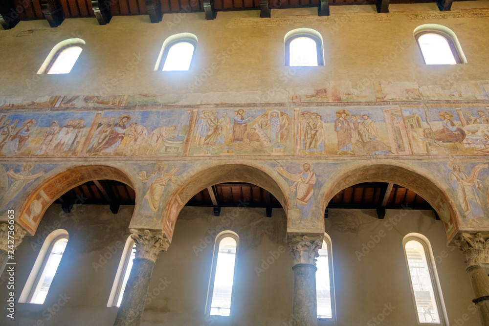 Arches and frescos in the abbey 'Sant'Angelo in Formis' in Capua, Campania, Italy.