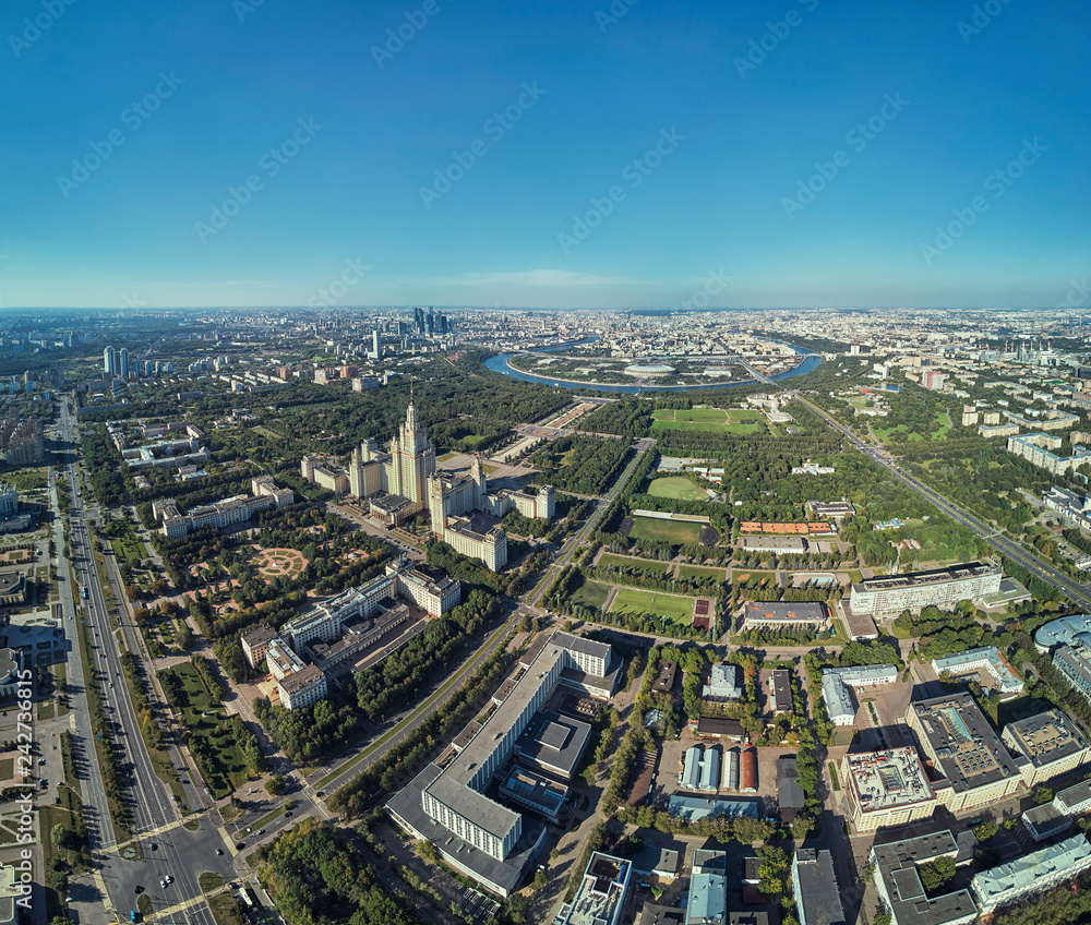 Obraz premium Aerial drone view of Lomonosov Moscow State University MGU, MSU on Sparrow Hills, Moscow, Russia. Beautiful park area