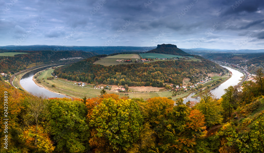 Panoramic  view on the the natural landscape from the Konigstein fortress wall in autumn. Top tourist attraction in Europe. Valley of river Elbe in Saxon Switzerland. Germany.